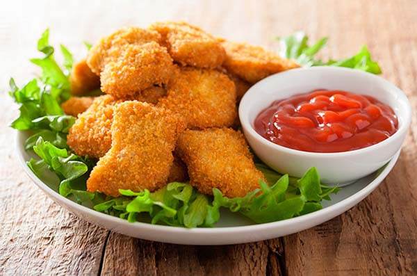 Nuggets de pollo, con altos niveles de grasa, pellejo y soya: Profeco