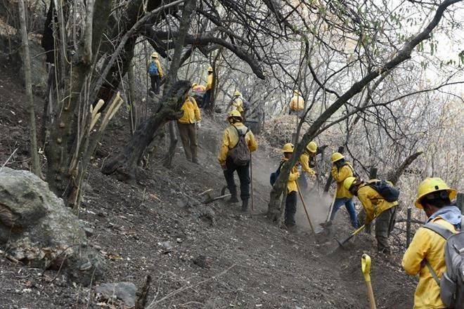 Controlan incendio gracias a lluvia en Tepoztlán