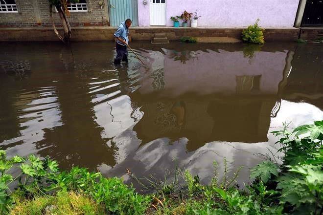 Deja lluvia inundaciones en Chalco e Ixtapaluca
