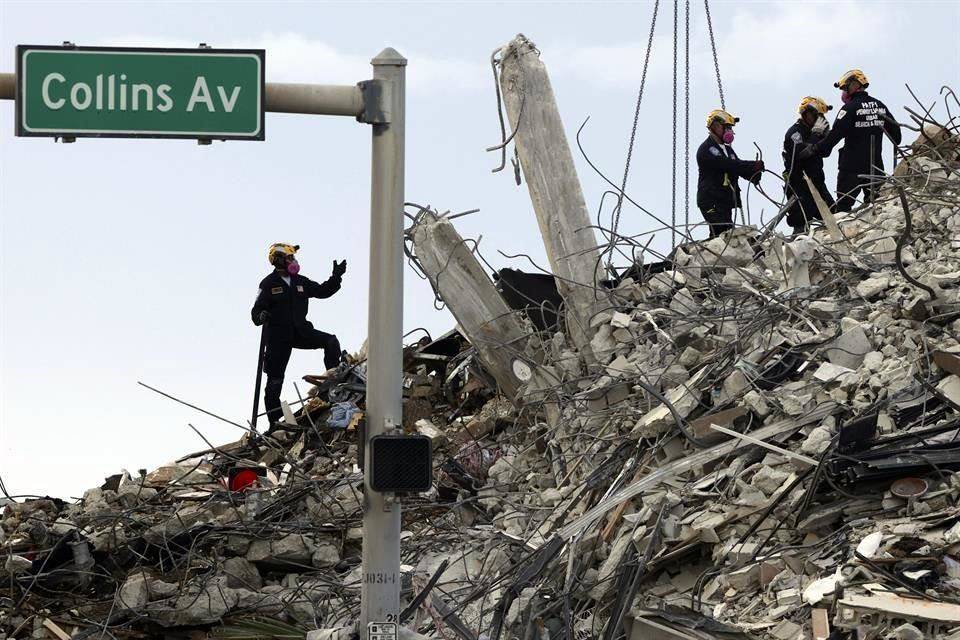 Retoman búsqueda tras derribar restos de edificio en Miami