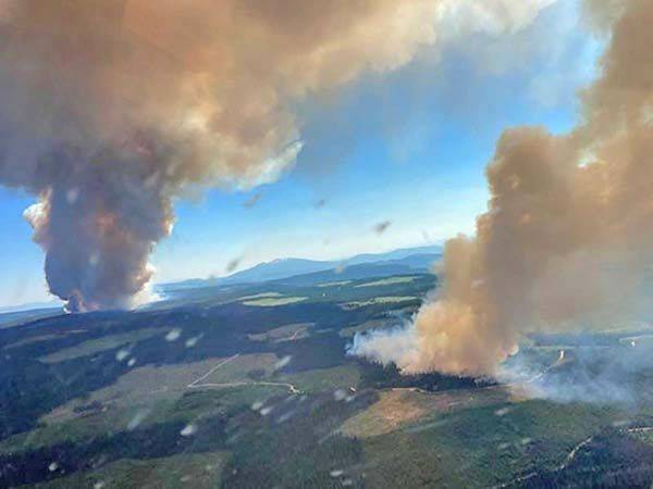 Incendios consumen el oeste de Canadá y California; hay miles de evacuados