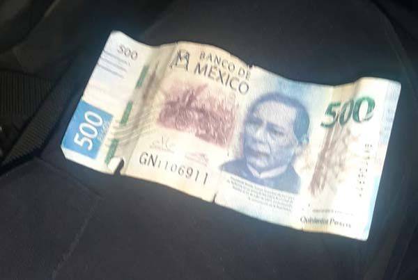 Intentan pagar con billete falso