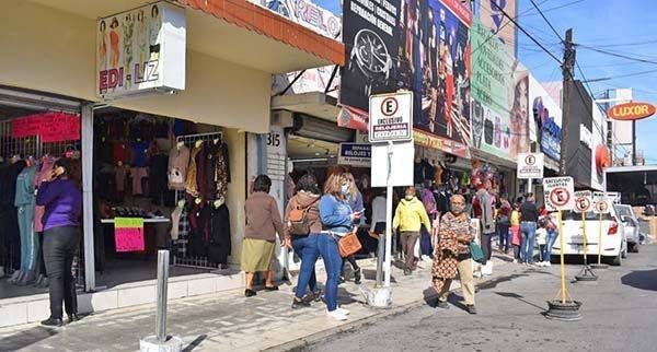 Temen otro cierre de comercios por Covid