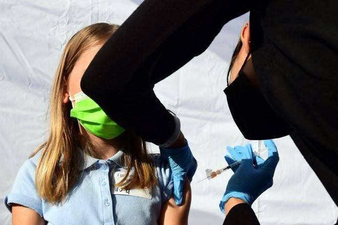 Suben 32% contagios de Covid de niños en EU