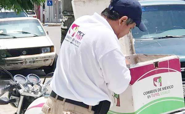 Esperan trabajadores postales, prestaciones