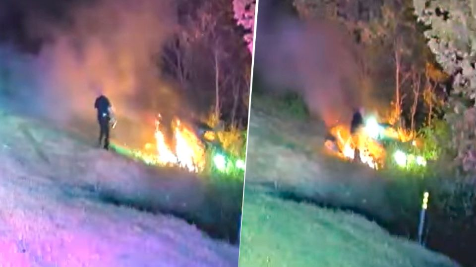 VIDEO: policía no lo duda y expone su vida por hombre en un auto en llamas
