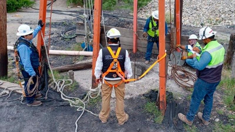 Recuperan restos del sexto minero